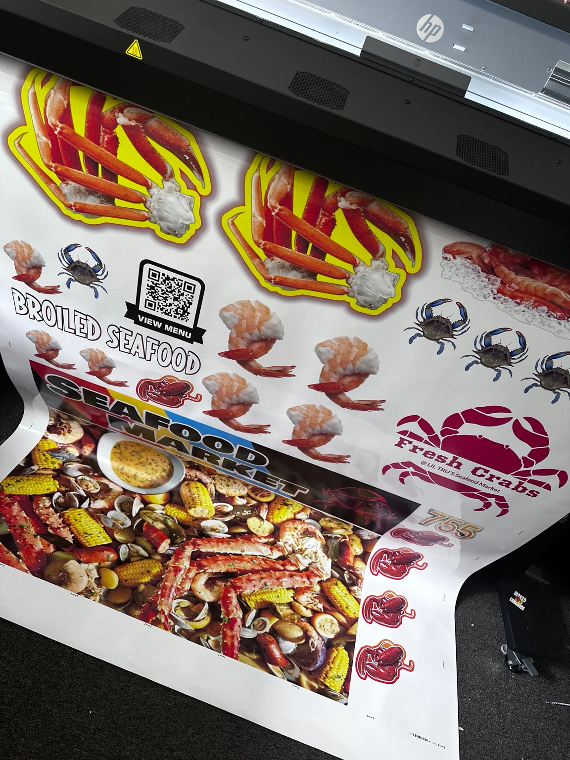 Large format seafood market print being produced by Tri State Prints